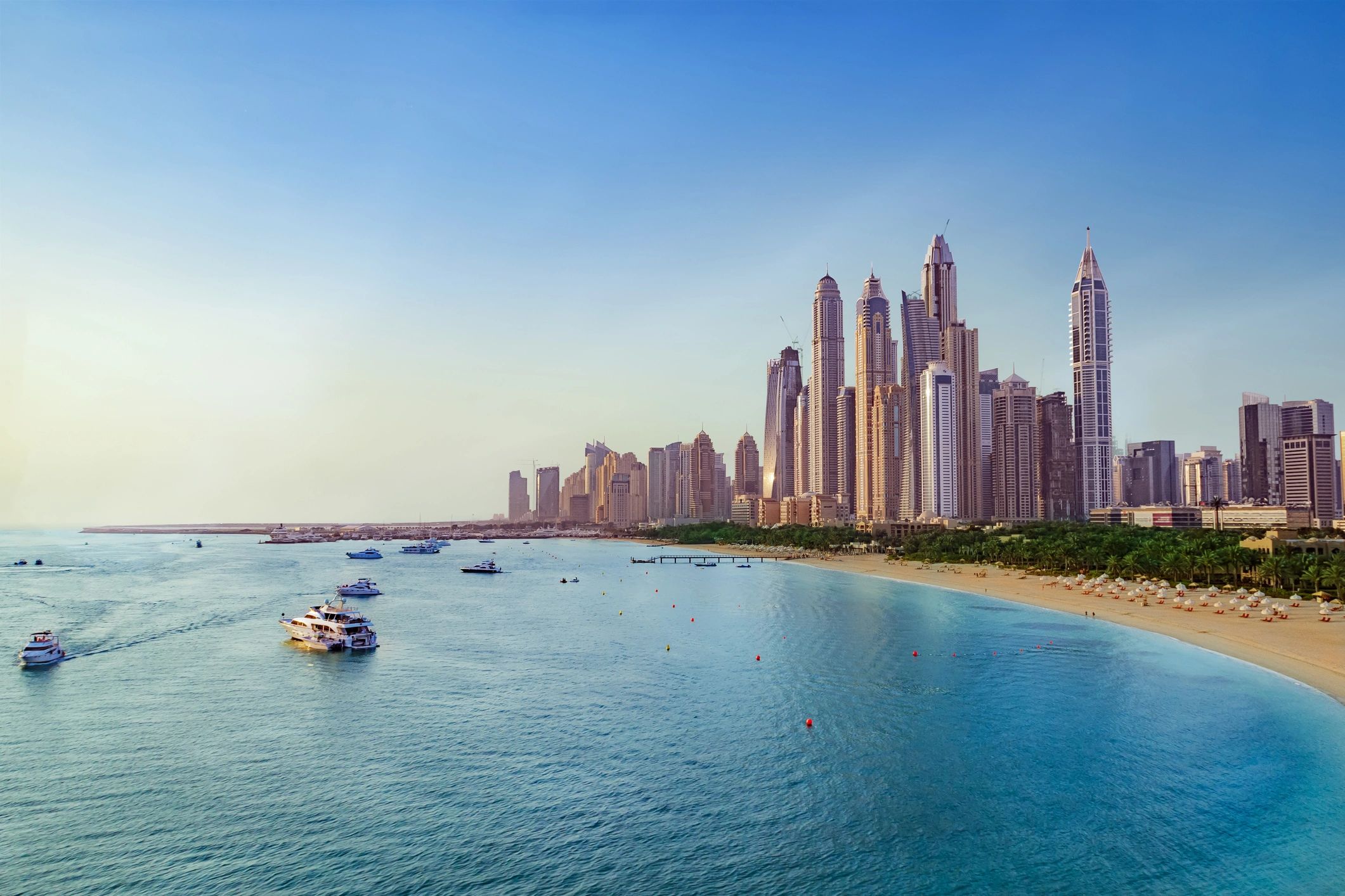 Infinity pool with panoramic city and sea views at Princess Tower.